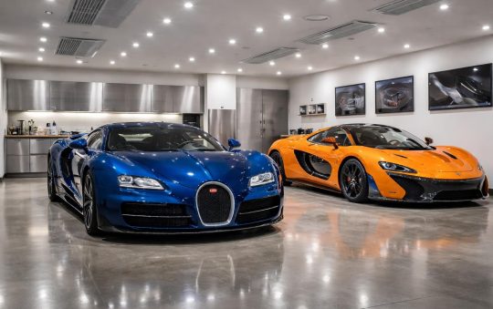 Collection automobile avec Bugatti Veyron et McLaren P1 dans garage climatisé premium